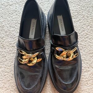 Steve Madden Glossy Black Loafers with Gold Accent